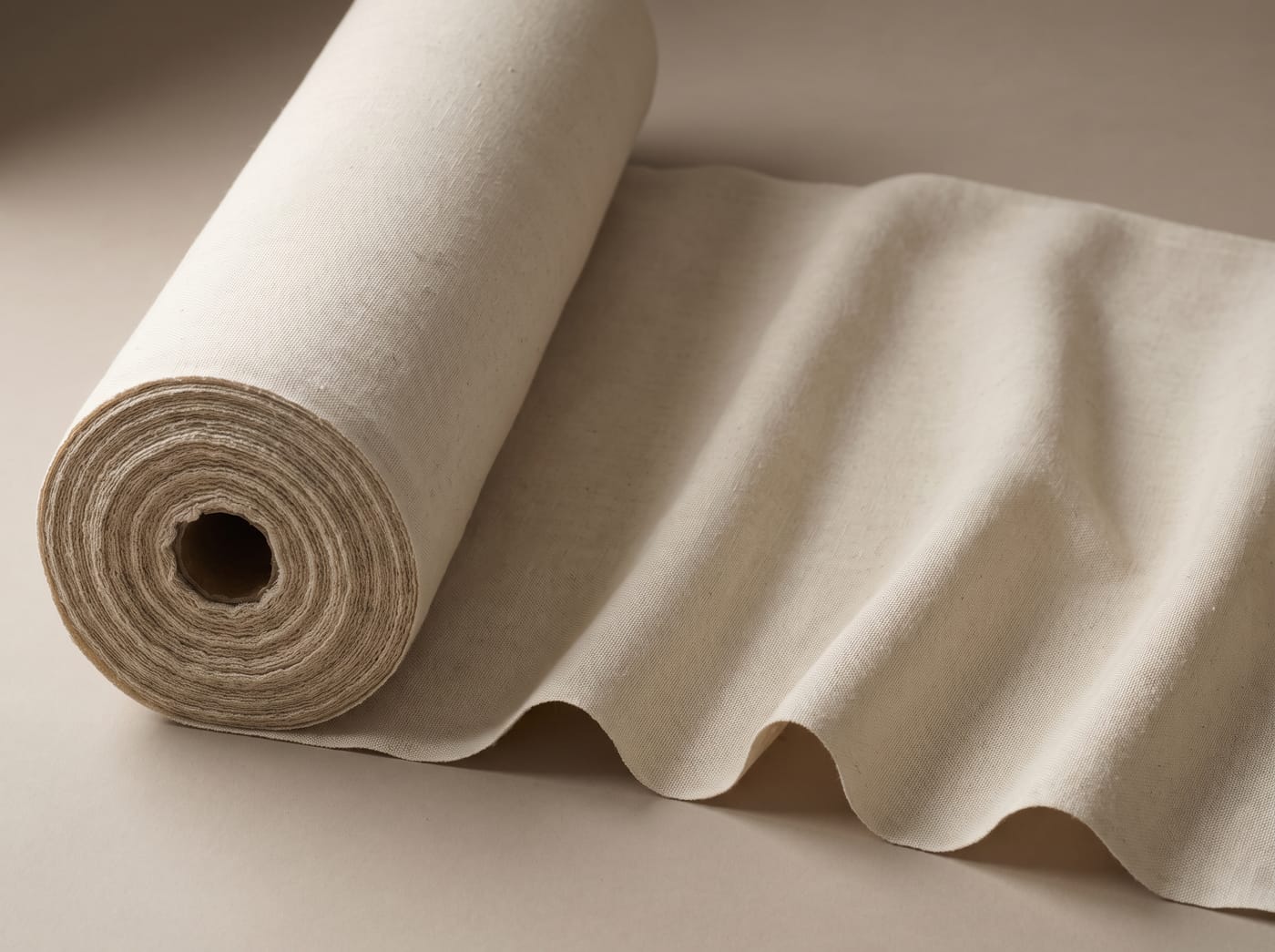 A cotton-linen blend in natural ecru, softer and more even than pure linen