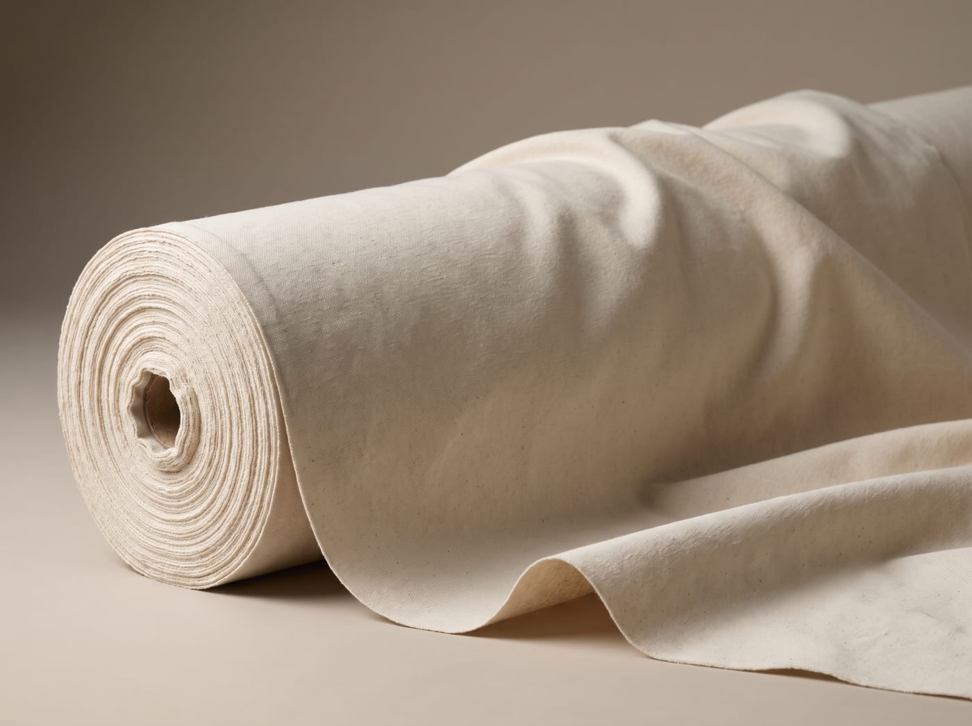 An extra-wide bolt of natural plain-weave cotton, wider than a standard roll